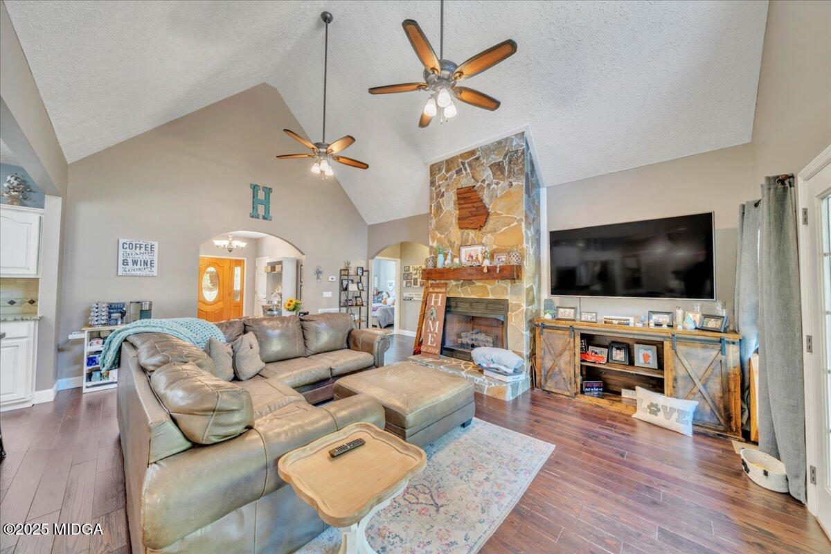 16 Little Collier Road Forsyth, GA 31029 - Photo 9 of 55 a living room with furniture and a flat screen tv