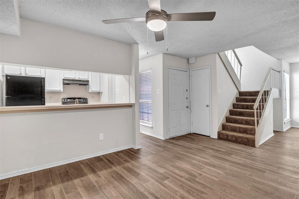 11311 Audelia Road, Unit 271 Dallas, TX 75243 - Photo 15 of 17 View from dining looking towards entry and stairway