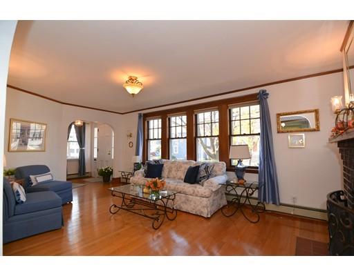 143 Overlook Road Arlington, MA 02474 - Photo 7 of 28 a living room with furniture and a large window