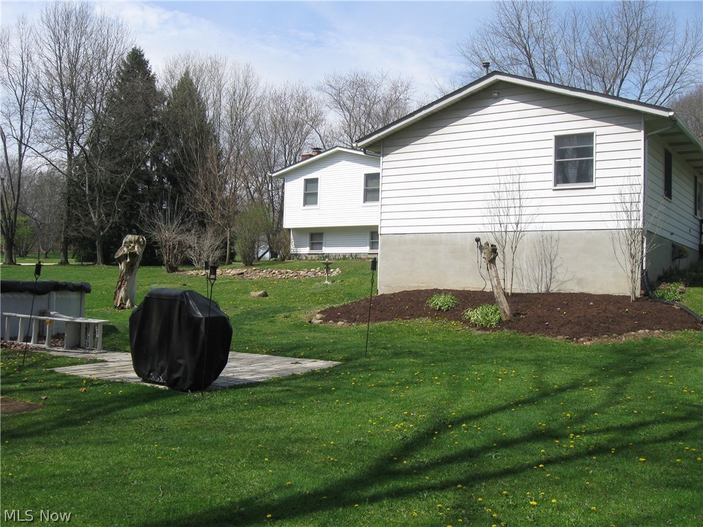 9020 Diagonal Road Streetsboro, OH 44241 - Photo 18 of 26 Grilling spot just waiting for you to enjoy a summer BBQ! Flower beds have been freshly mulched and pretty flowers are popping up adding a splash of color!