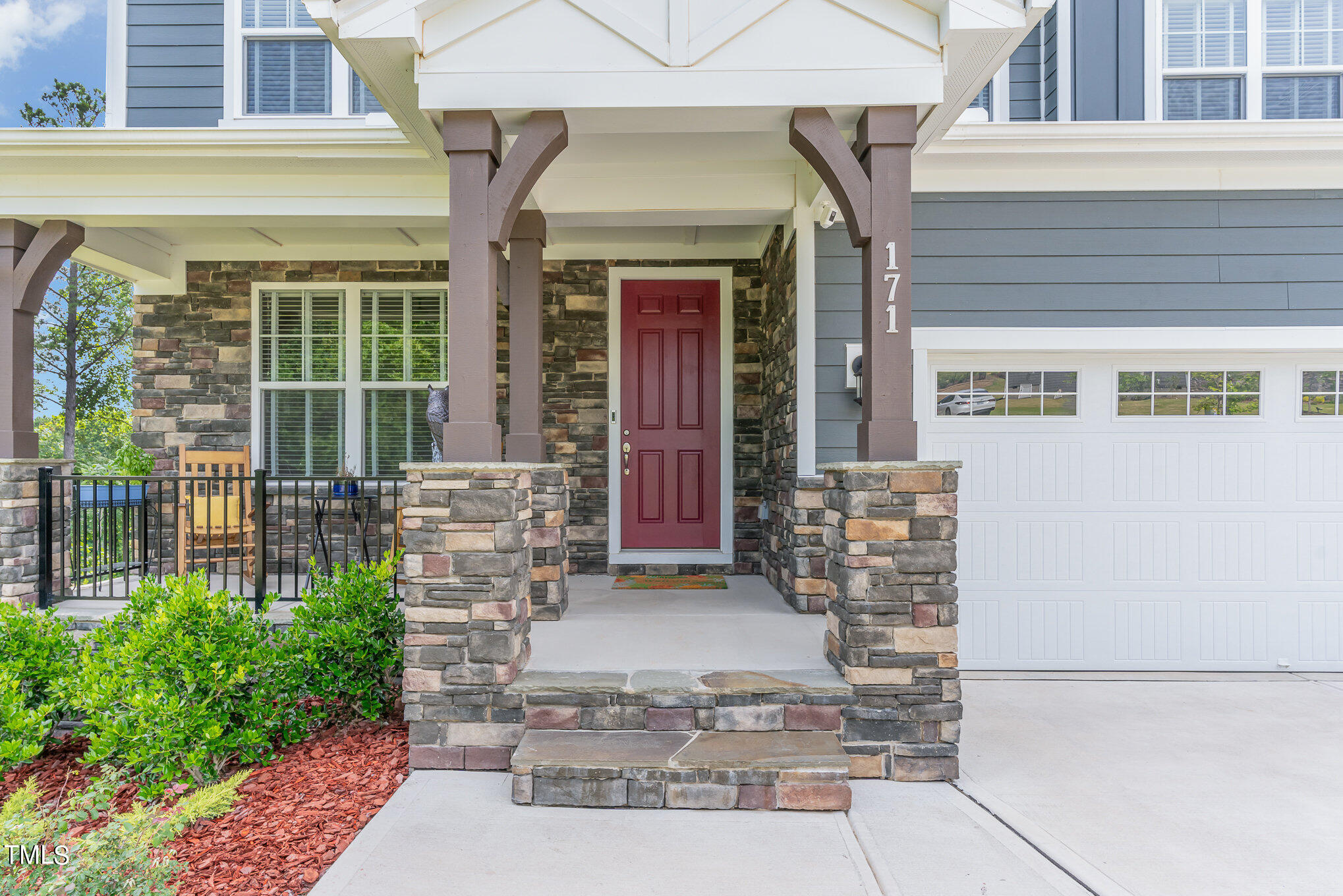 171 High Woods Ridge Pittsboro, NC 27312 - Photo 2 of 51 a front view of a house with a yard