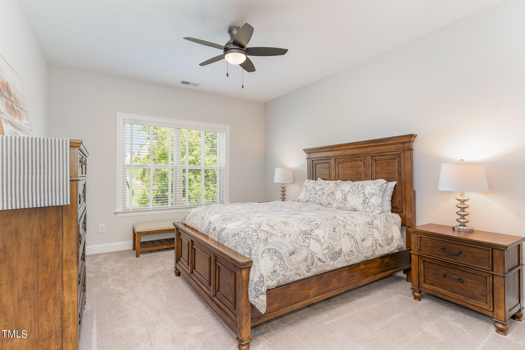 171 High Woods Ridge Pittsboro, NC 27312 - Photo 22 of 51 a bedroom with a bed and a window