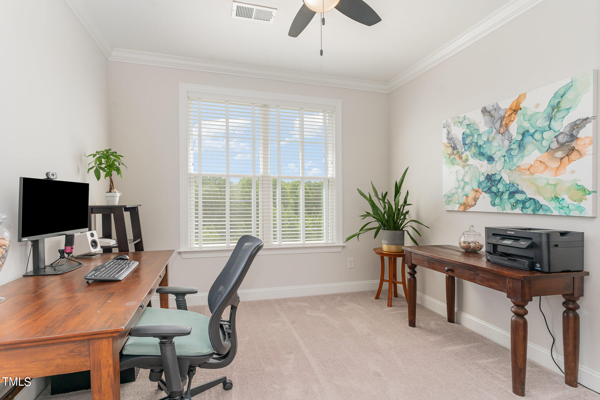 171 High Woods Ridge Pittsboro, NC 27312 - Photo 29 of 51 a view of a workspace with furniture and a potted plant