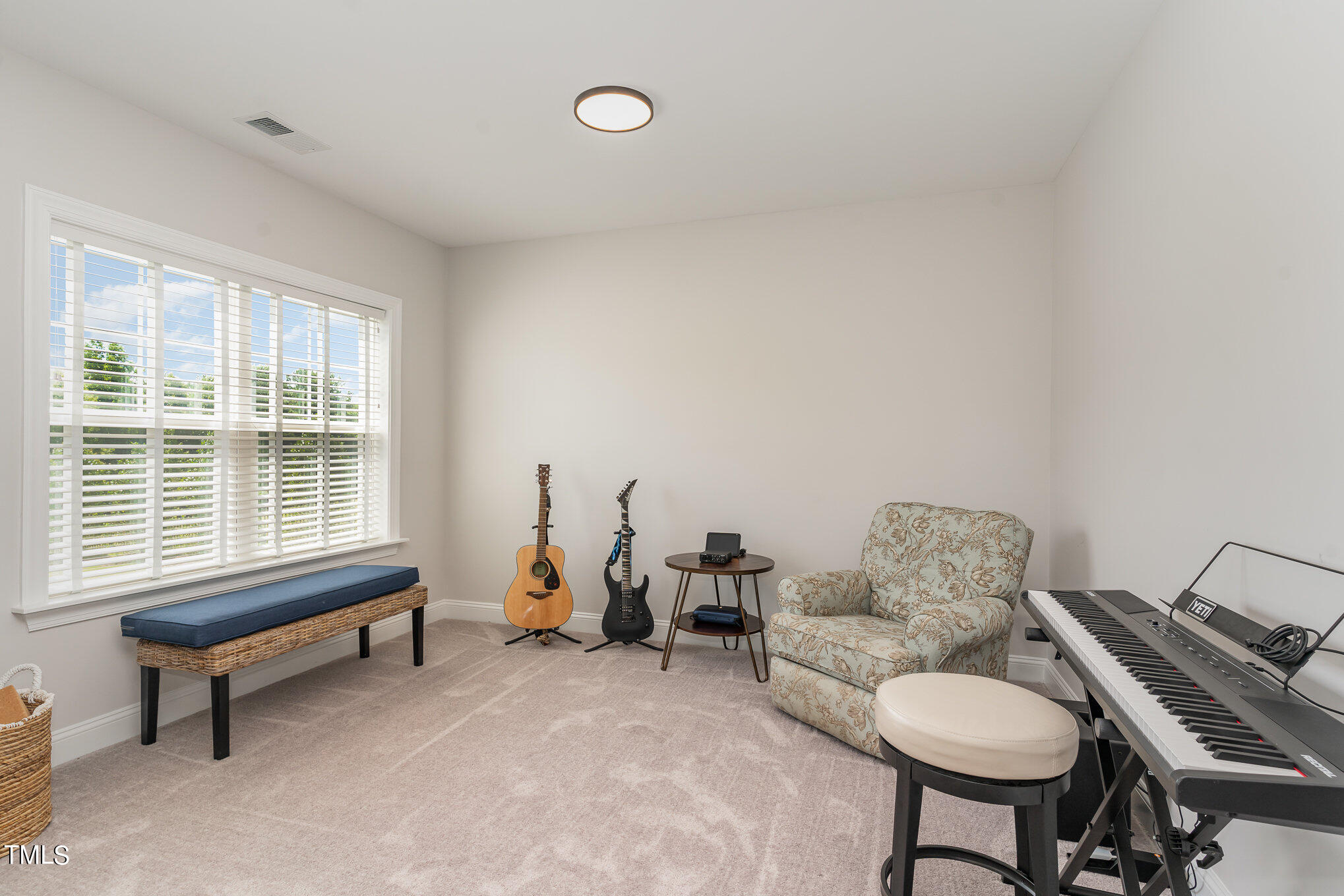 171 High Woods Ridge Pittsboro, NC 27312 - Photo 31 of 51 a living room with furniture and a window