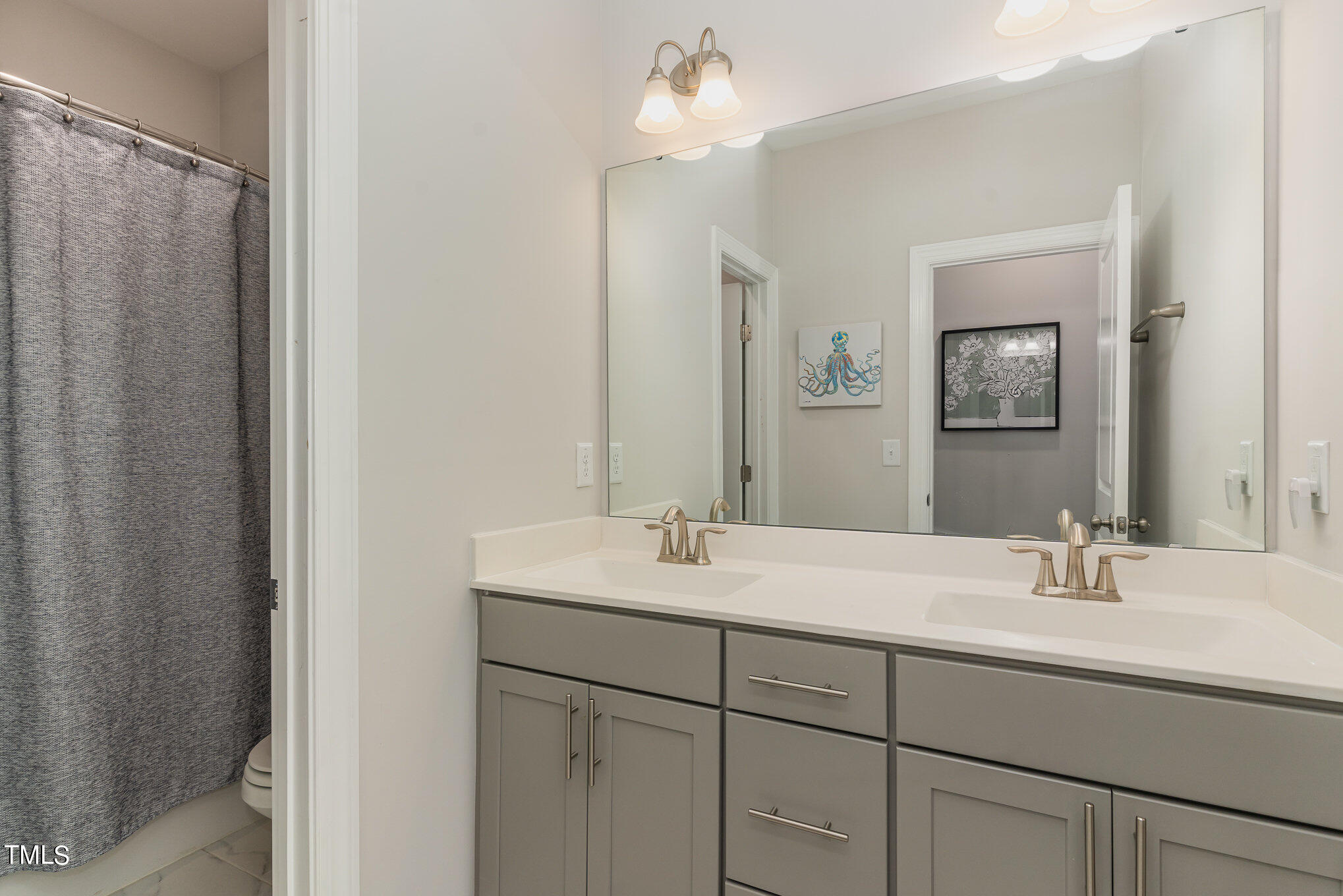 171 High Woods Ridge Pittsboro, NC 27312 - Photo 33 of 51 a bathroom with a sink and a mirror