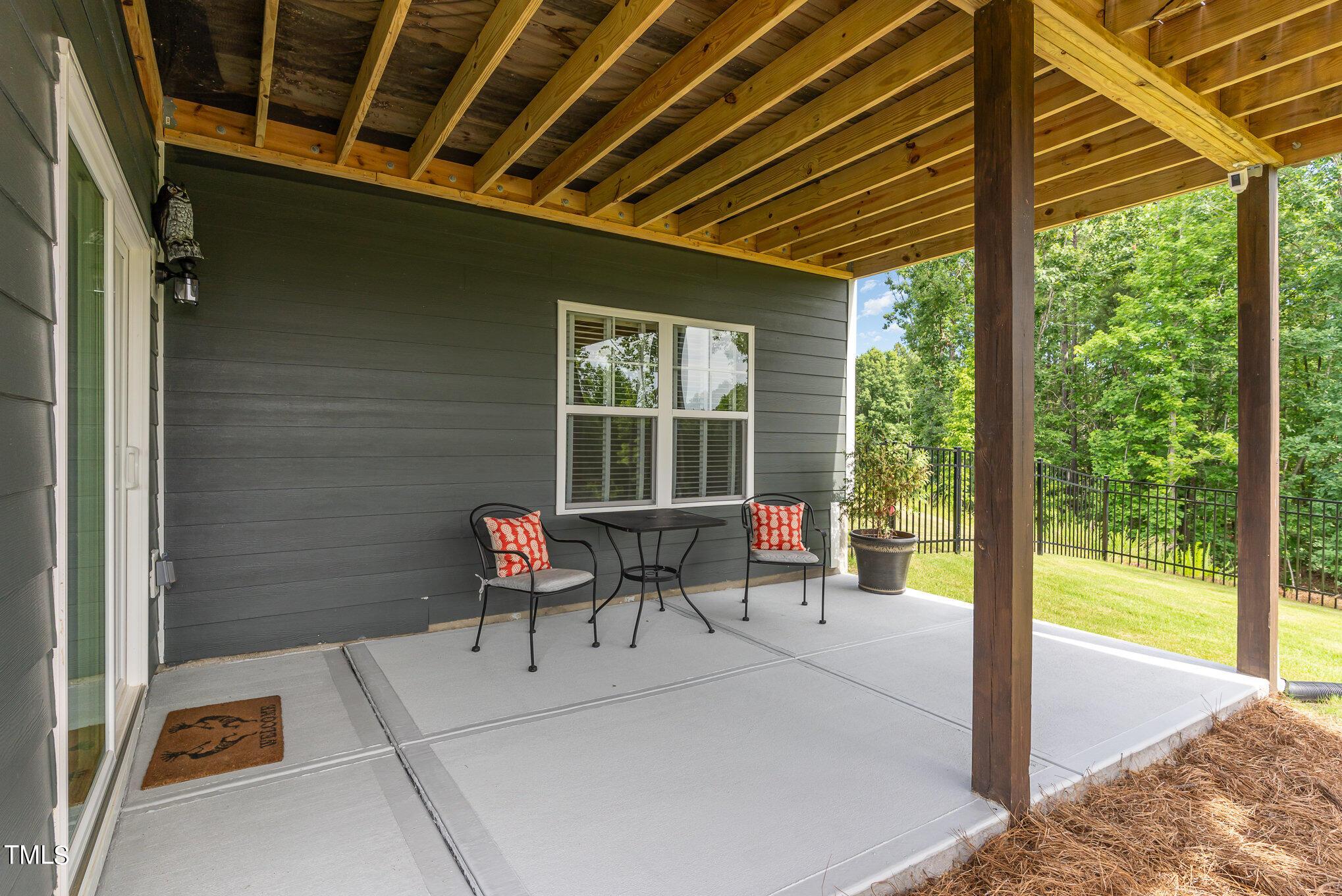 171 High Woods Ridge Pittsboro, NC 27312 - Photo 37 of 51 a balcony with furniture and a gate