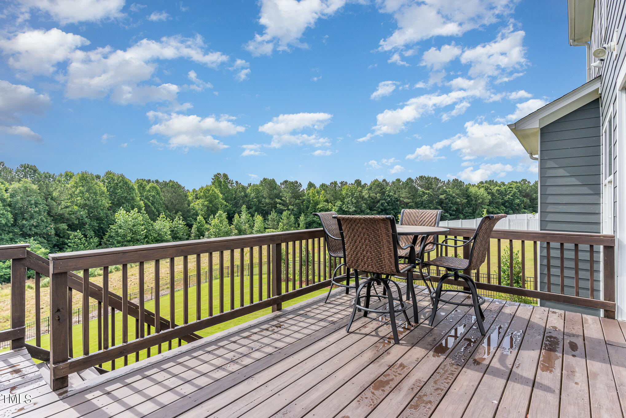 171 High Woods Ridge Pittsboro, NC 27312 - Photo 9 of 51 a view of a chairs on a deck
