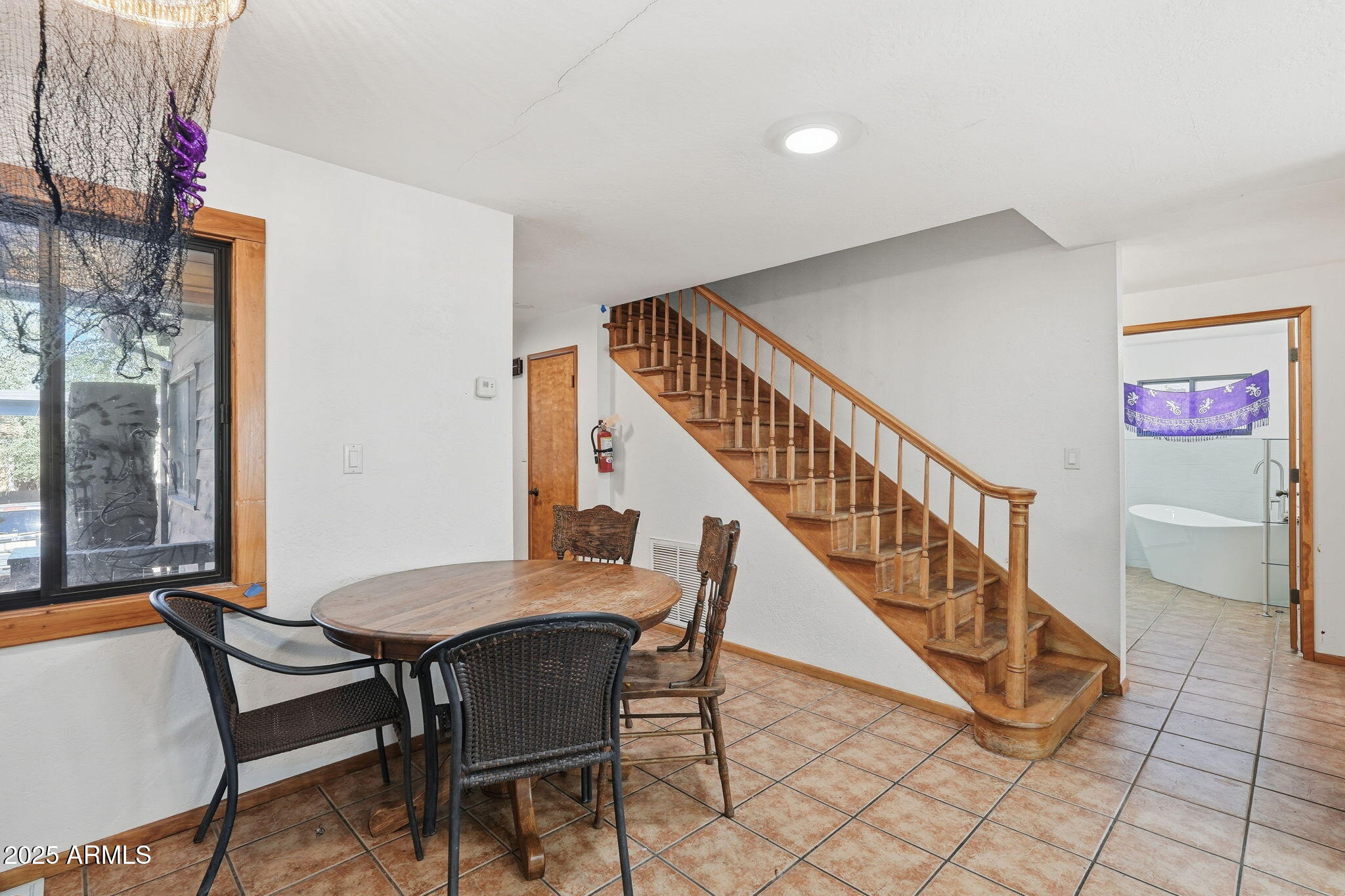 401 South Mariposa Street Payson, AZ 85541 - Photo 14 of 39 a view of a livingroom with furniture and stairs