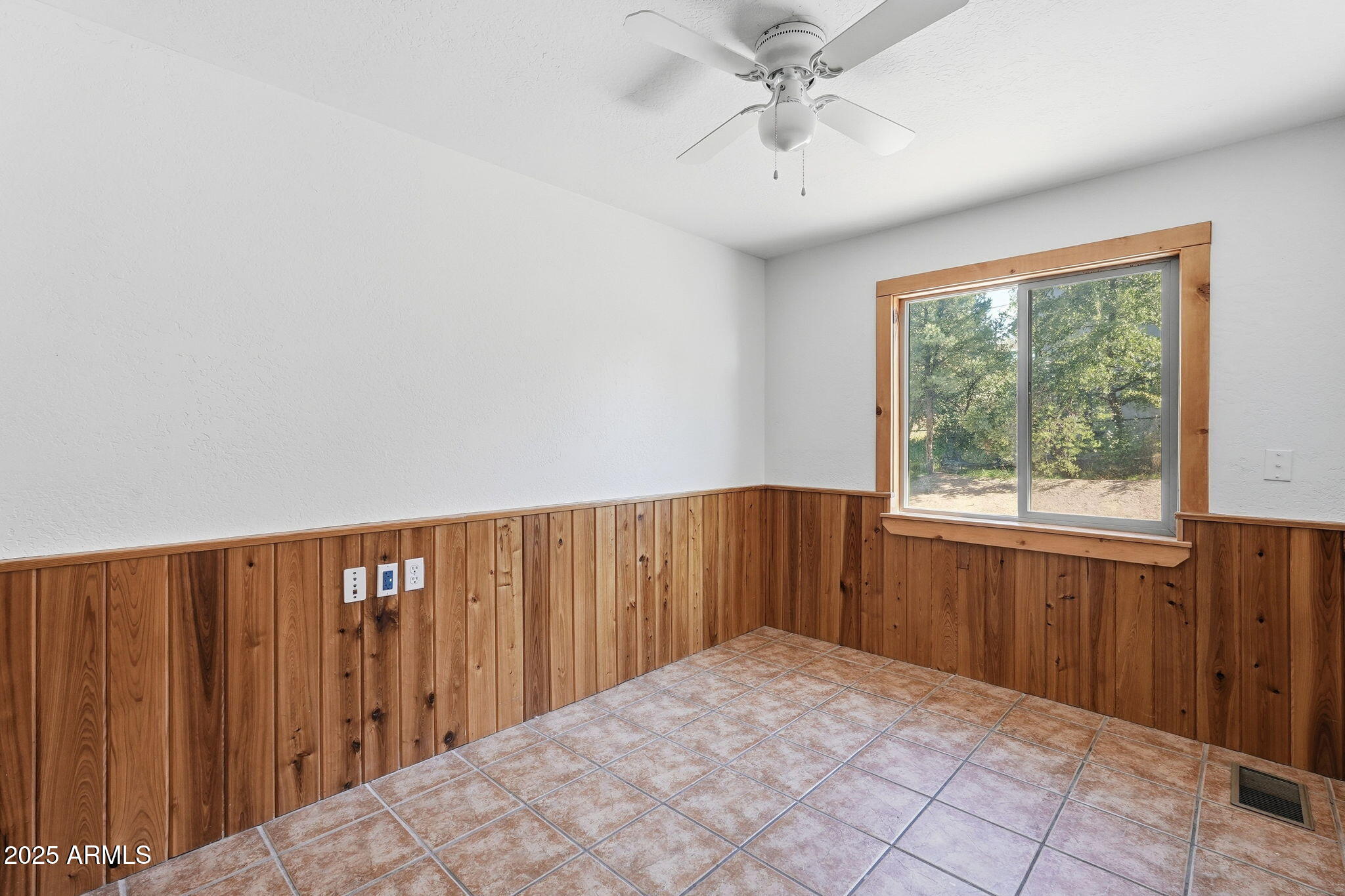 401 South Mariposa Street Payson, AZ 85541 - Photo 15 of 39 a view of a livingroom with a window and a ceiling fan