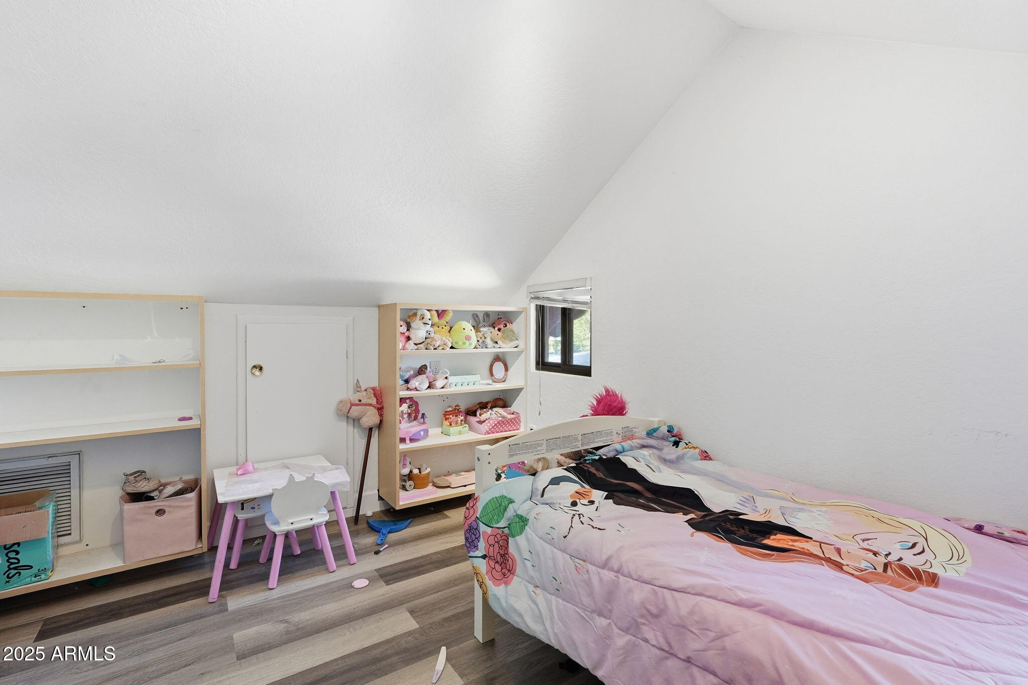 401 South Mariposa Street Payson, AZ 85541 - Photo 19 of 39 a bedroom with a bed and a chandelier