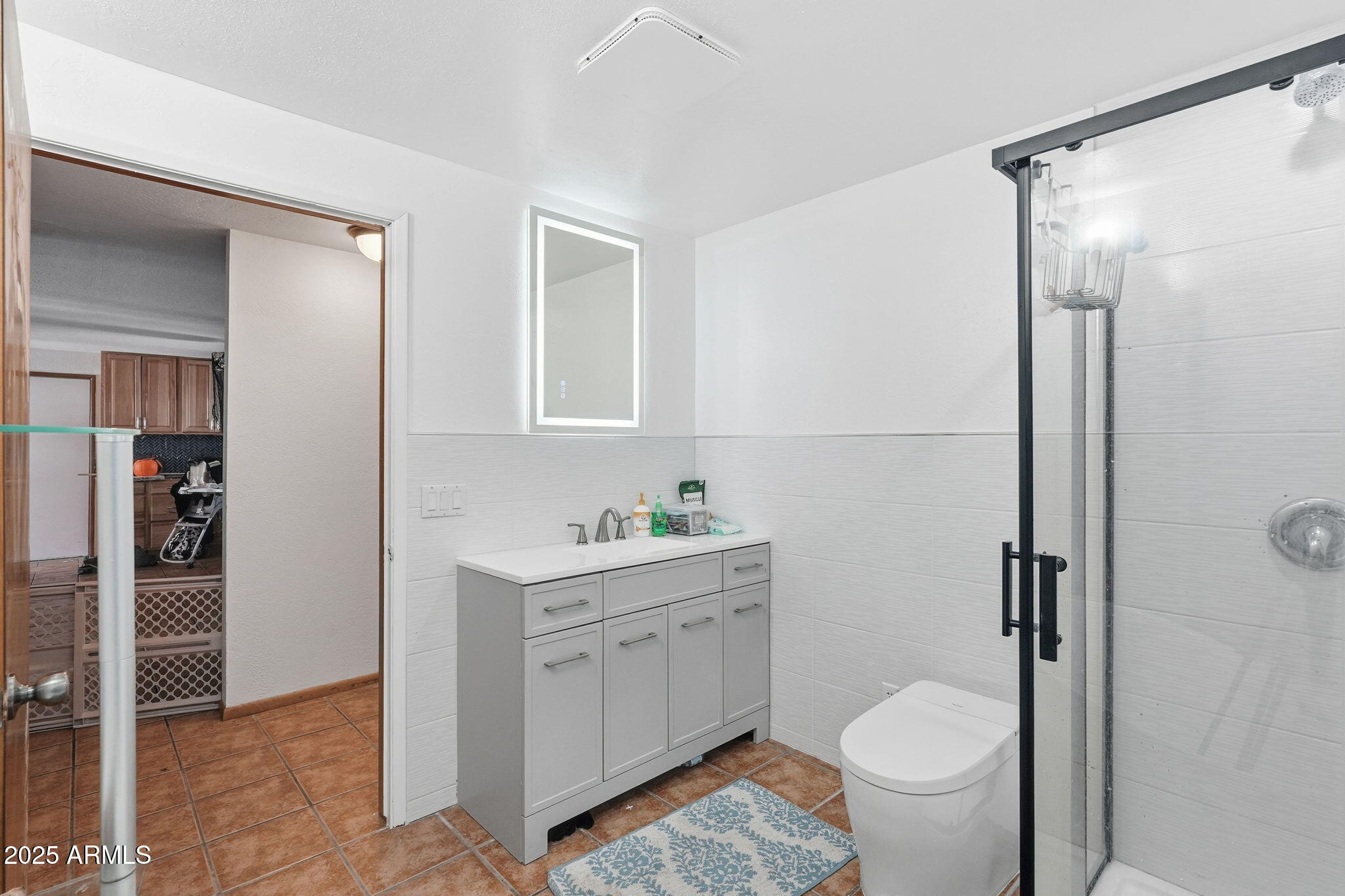 401 South Mariposa Street Payson, AZ 85541 - Photo 27 of 39 a bathroom with a granite countertop sink toilet and shower