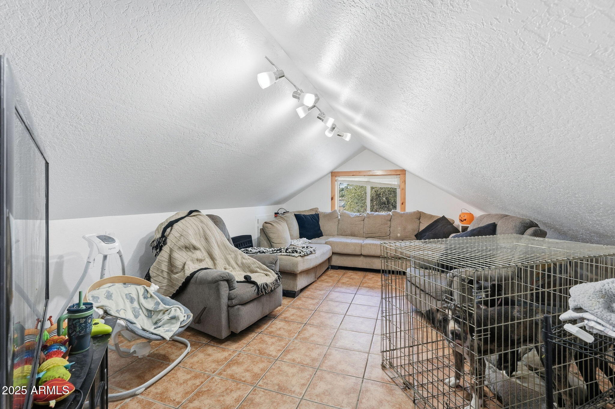 401 South Mariposa Street Payson, AZ 85541 - Photo 34 of 39 a living room with furniture stairs and a chandelier