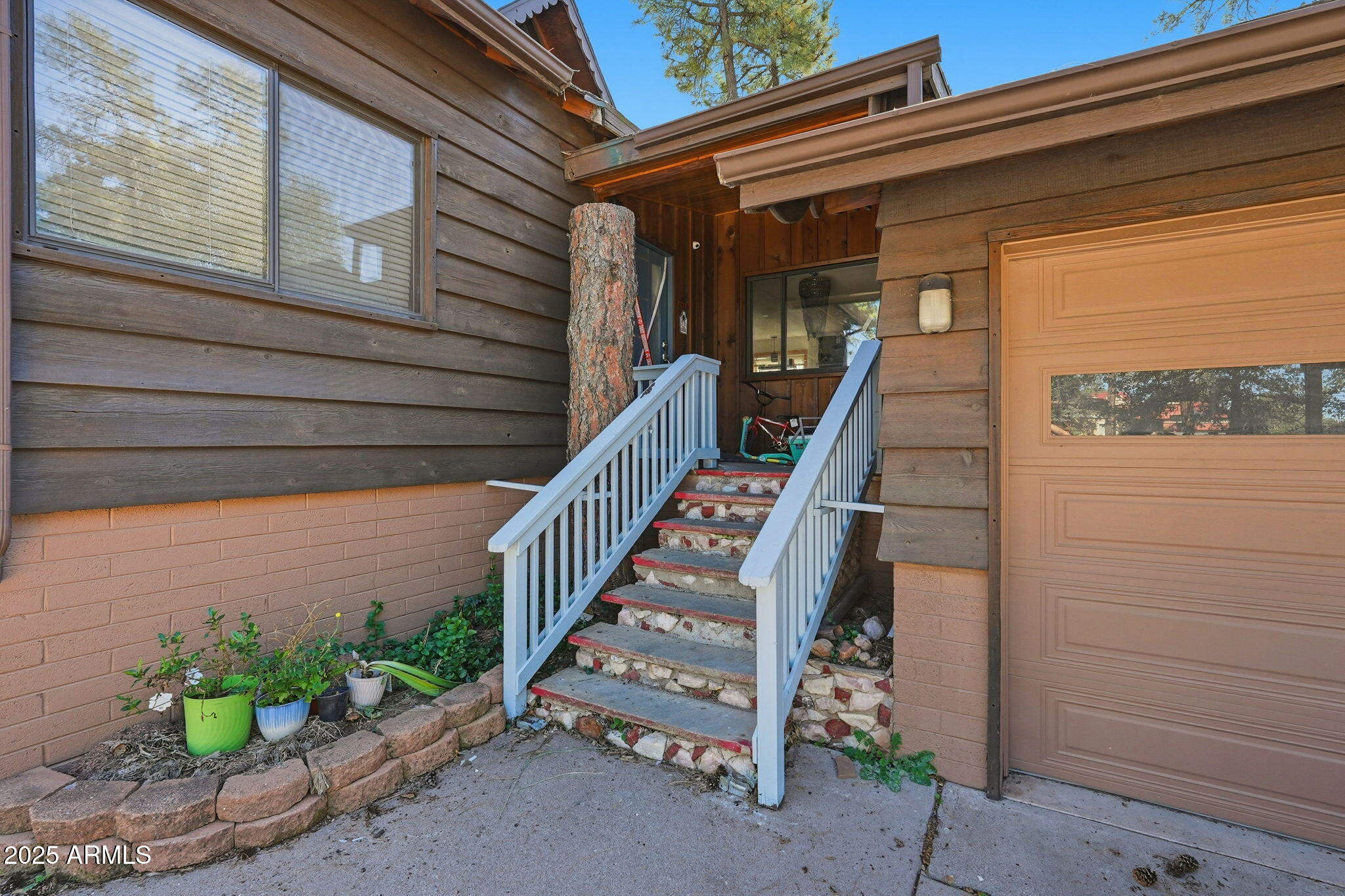 401 South Mariposa Street Payson, AZ 85541 - Photo 5 of 39 a view of a house with a potted plant
