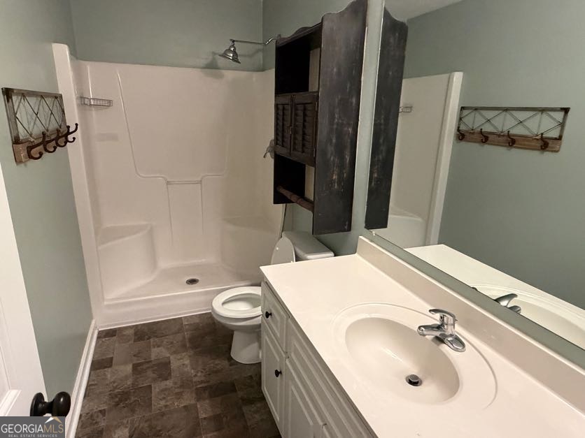 187 Buckhaven Way Statesboro, GA 30458 - Photo 14 of 20 a bathroom with a sink toilet and shower