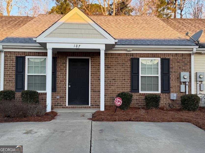 187 Buckhaven Way Statesboro, GA 30458 - Photo 2 of 20 a front view of a house with garden