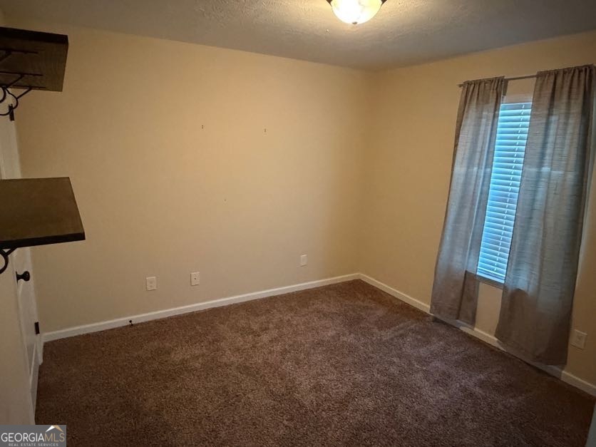 187 Buckhaven Way Statesboro, GA 30458 - Photo 10 of 20 an empty room with windows