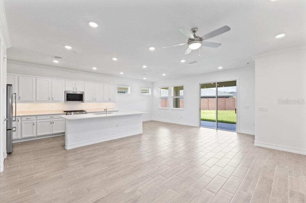 3223 Northwest 52nd Avenue Road Ocala, FL 34482 - Photo 9 of 25 a view of kitchen with sink and microwave