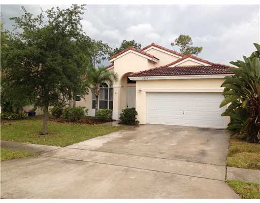6586 Spring Meadow Drive Greenacres, FL 33413 - Photo 1 of 11 Primary Photo