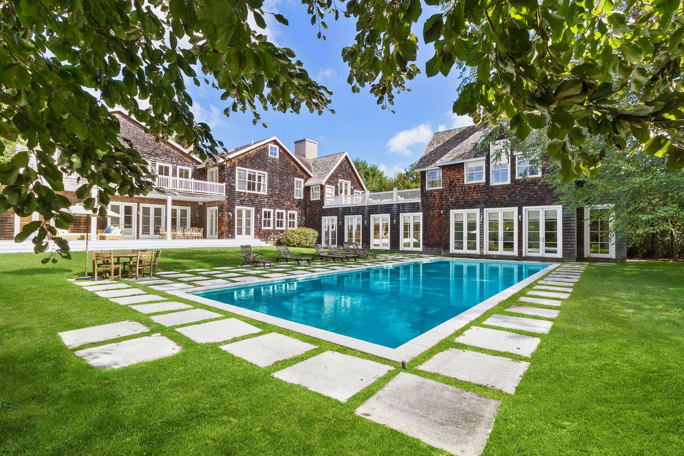 a view of a house with a swimming pool