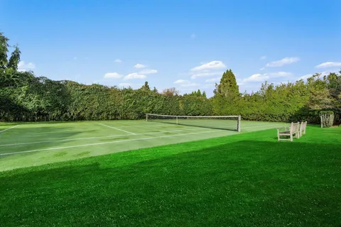 a view of a golf course with a lake