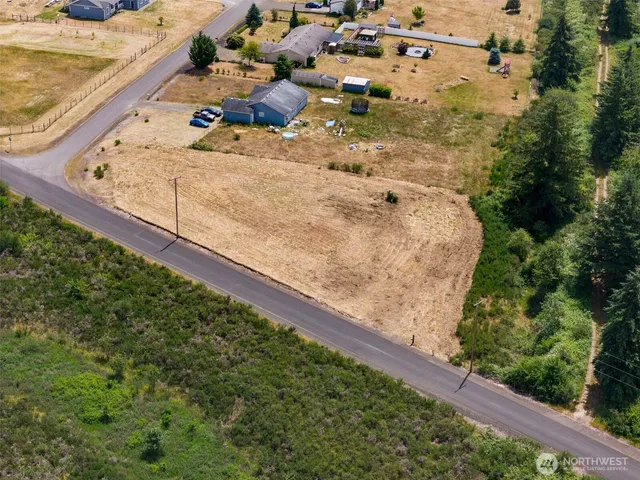 a view of a wooden floor with a yard
