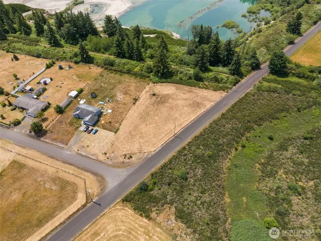 a view of a street with an ocean view