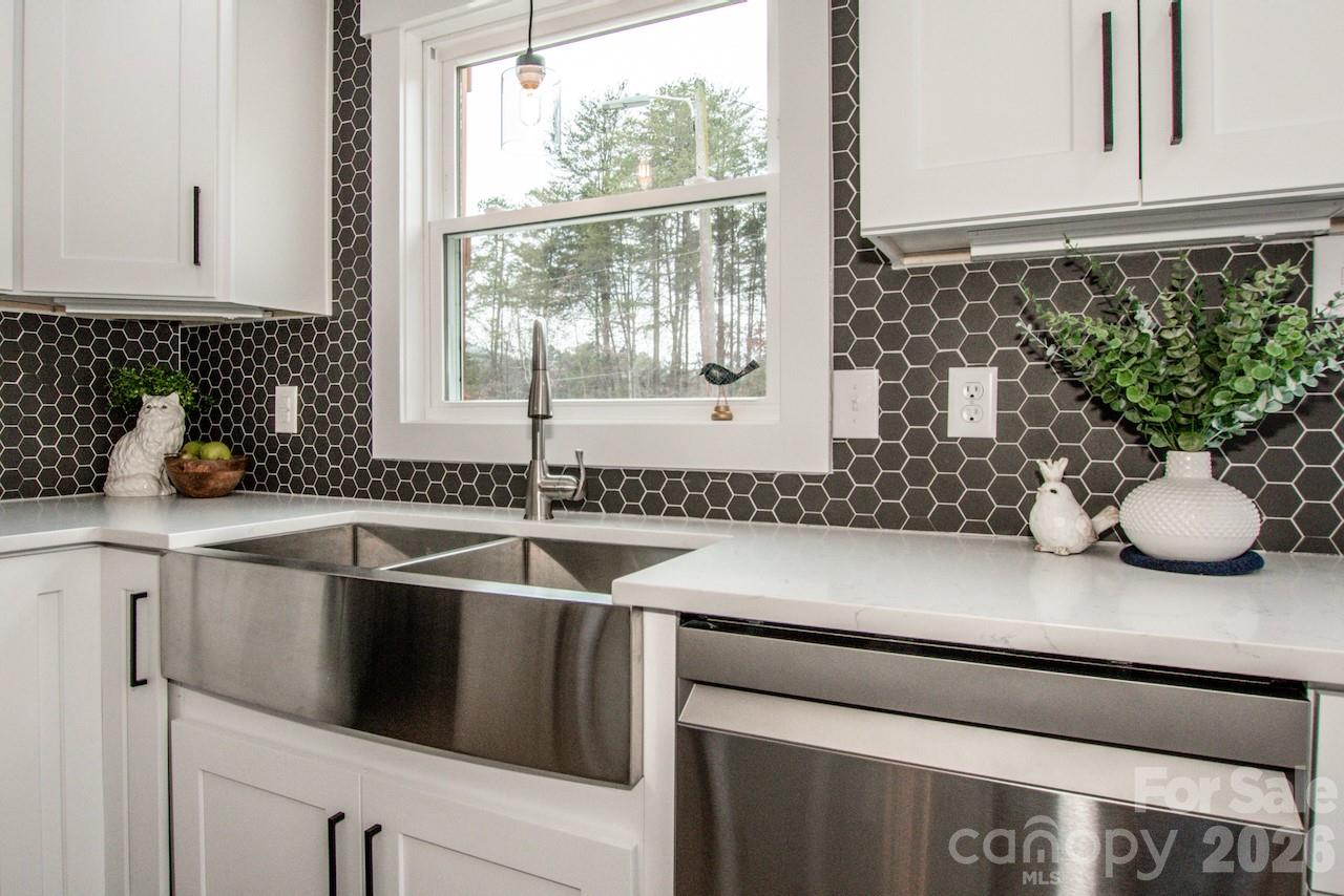 6229 Mountain Grove Road Hickory, NC 28602 - Photo 14 of 41 a kitchen with a sink and a window