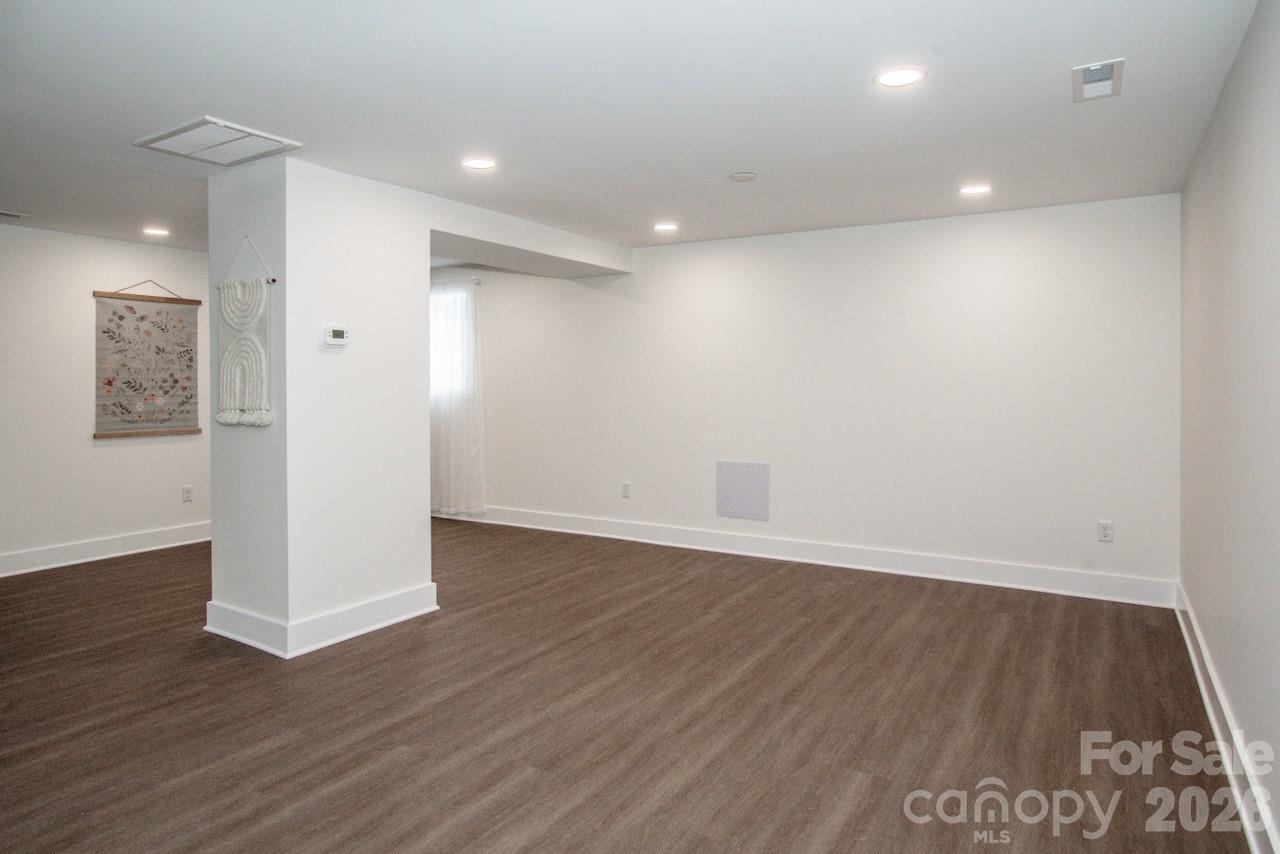 6229 Mountain Grove Road Hickory, NC 28602 - Photo 25 of 41 a view of an empty room with wooden floor