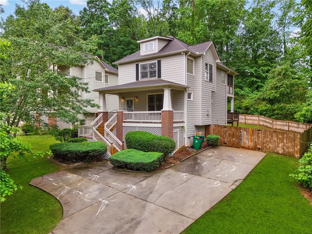 1601 Peachcrest Road Decatur, GA 30032 - Photo 1 of 1 a front view of a house with garden