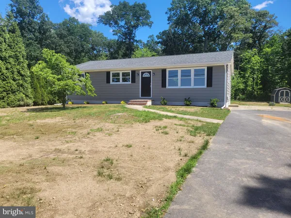 a house with trees in front of it