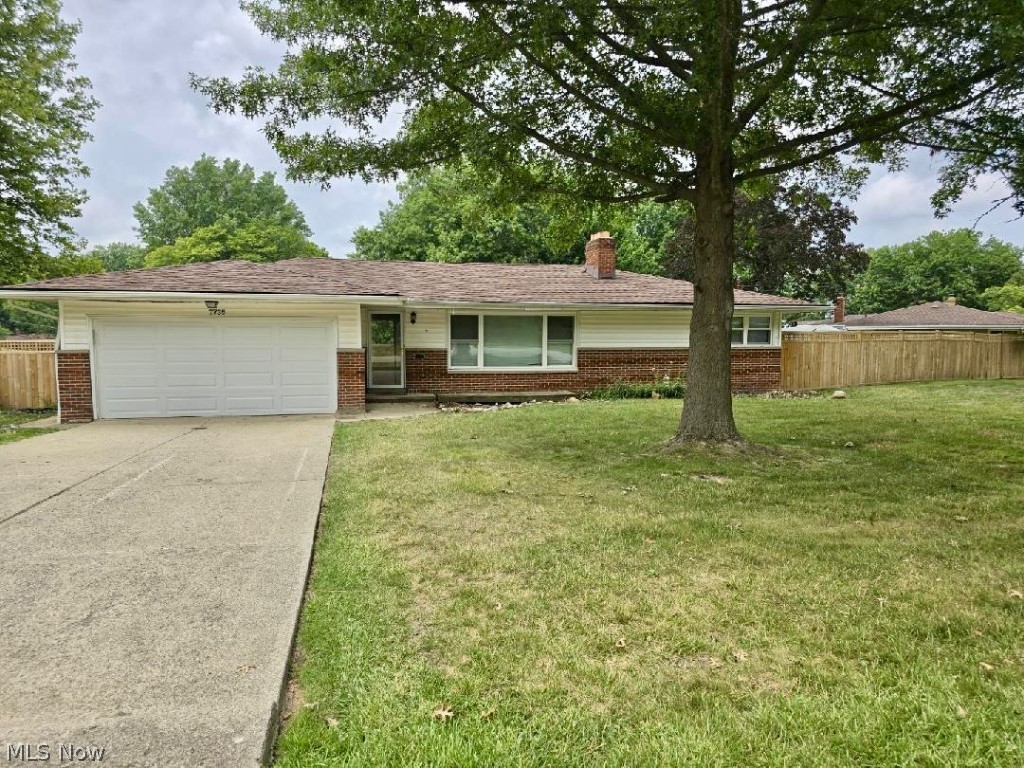 7735 Ragall Parkway Cleveland, OH 44130 - Photo 1 of 32 Single story home featuring a garage and a front lawn