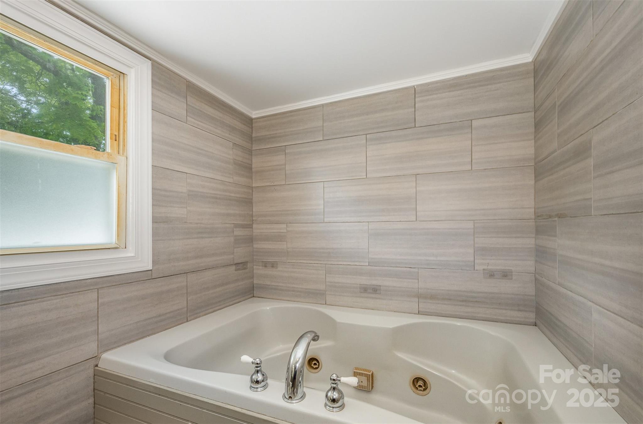 201 Valley Street Stanley, NC 28164 - Photo 15 of 25 a bathroom with a bathtub