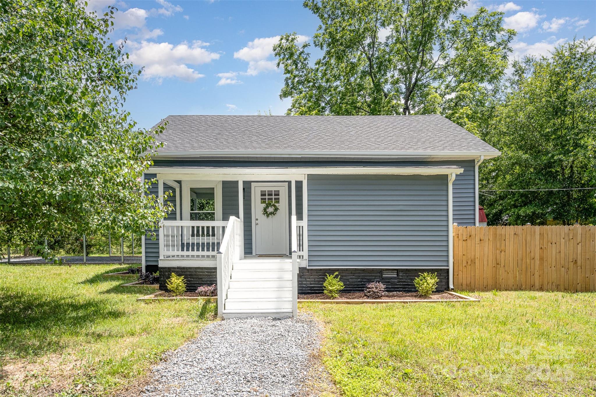201 Valley Street Stanley, NC 28164 - Photo 19 of 25 front view of house with a yard