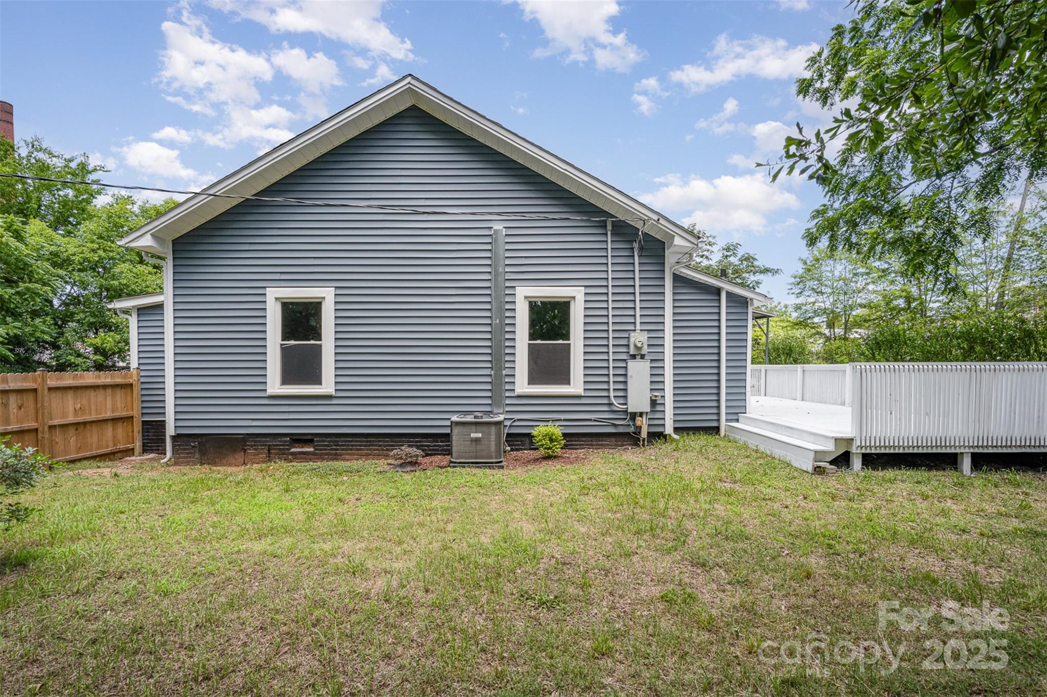201 Valley Street Stanley, NC 28164 - Photo 21 of 25 a front view of a house with a yard