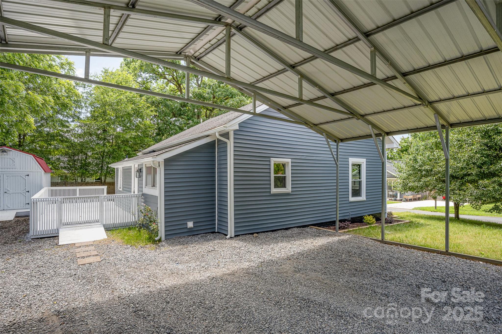 201 Valley Street Stanley, NC 28164 - Photo 23 of 25 a backyard of a house with shaded area