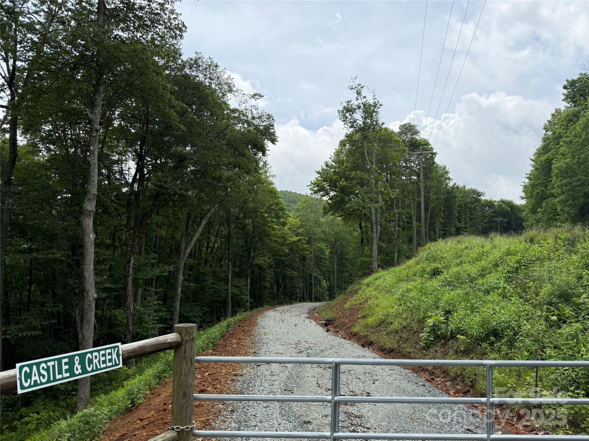 Tbd Junaluska Road Vilas, NC 28692 - Photo 20 of 34 a backyard of a house with lots of green space