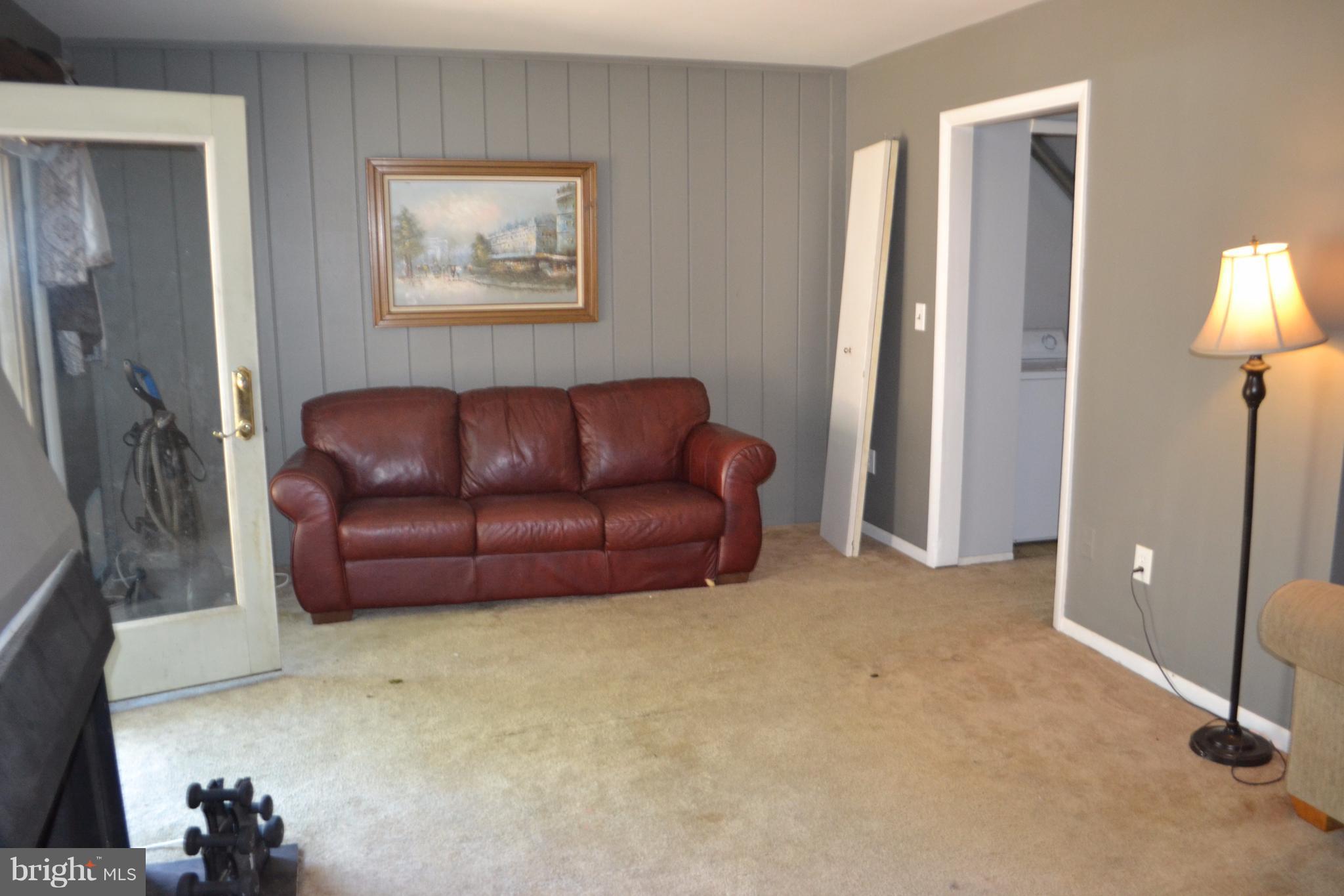 1054 Cedar Ridge Court Annapolis, MD 21403 - Photo 9 of 10 Living Room with sliding glass door to patio