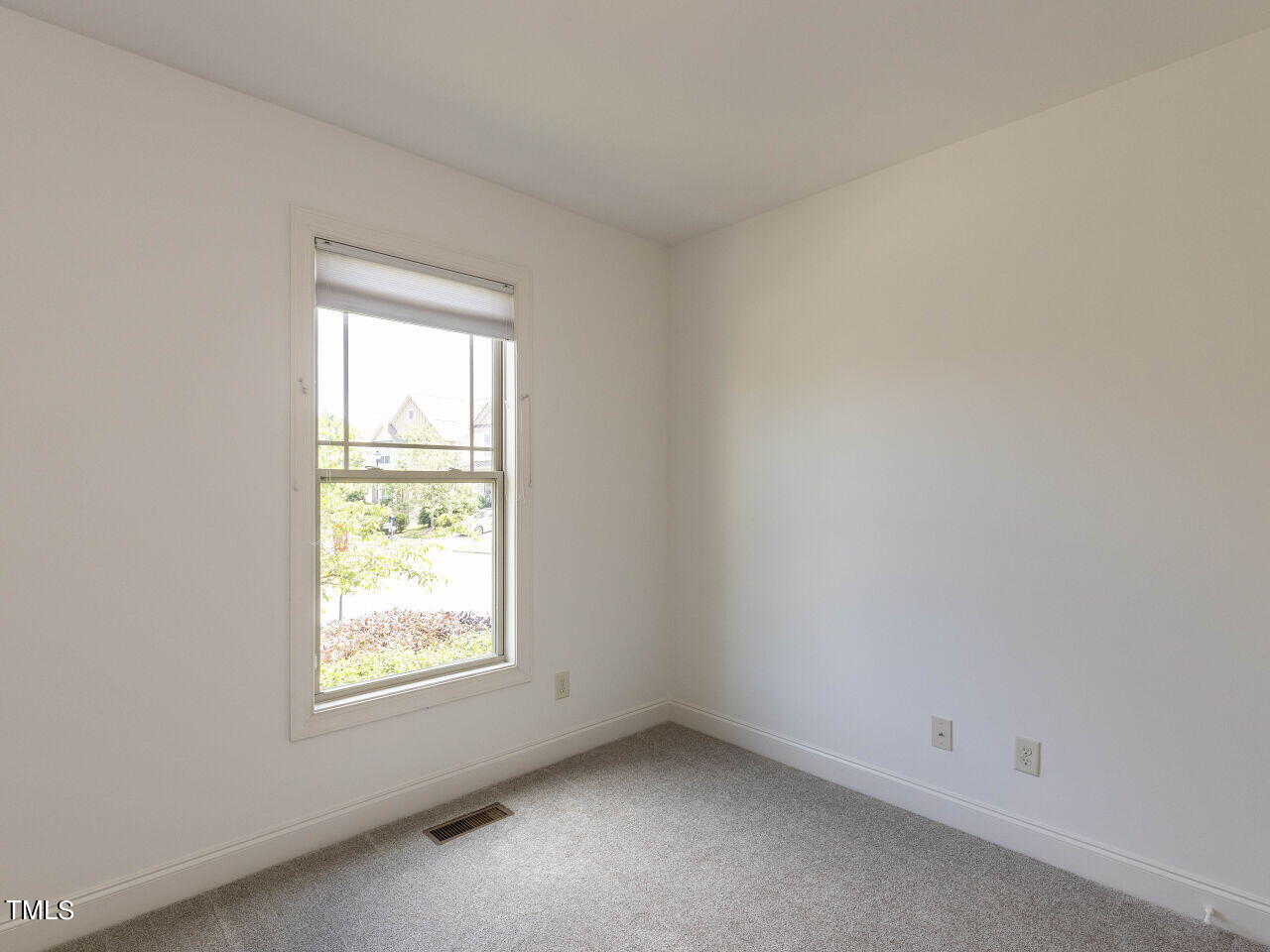 1805 Stonebanks Loop Cary, NC 27518 - Photo 15 of 27 an empty room with a window