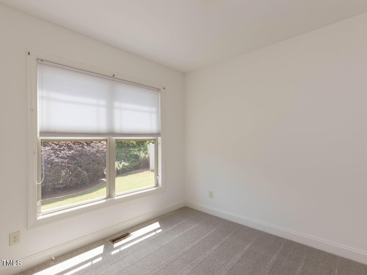 1805 Stonebanks Loop Cary, NC 27518 - Photo 17 of 27 an empty room with a window