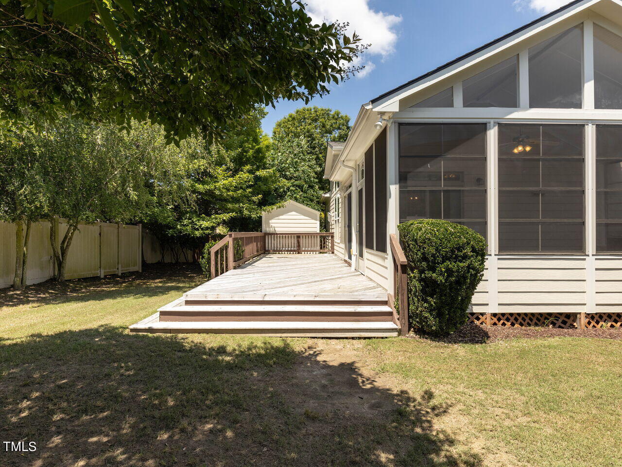 1805 Stonebanks Loop Cary, NC 27518 - Photo 24 of 27 a front view of a house with garden