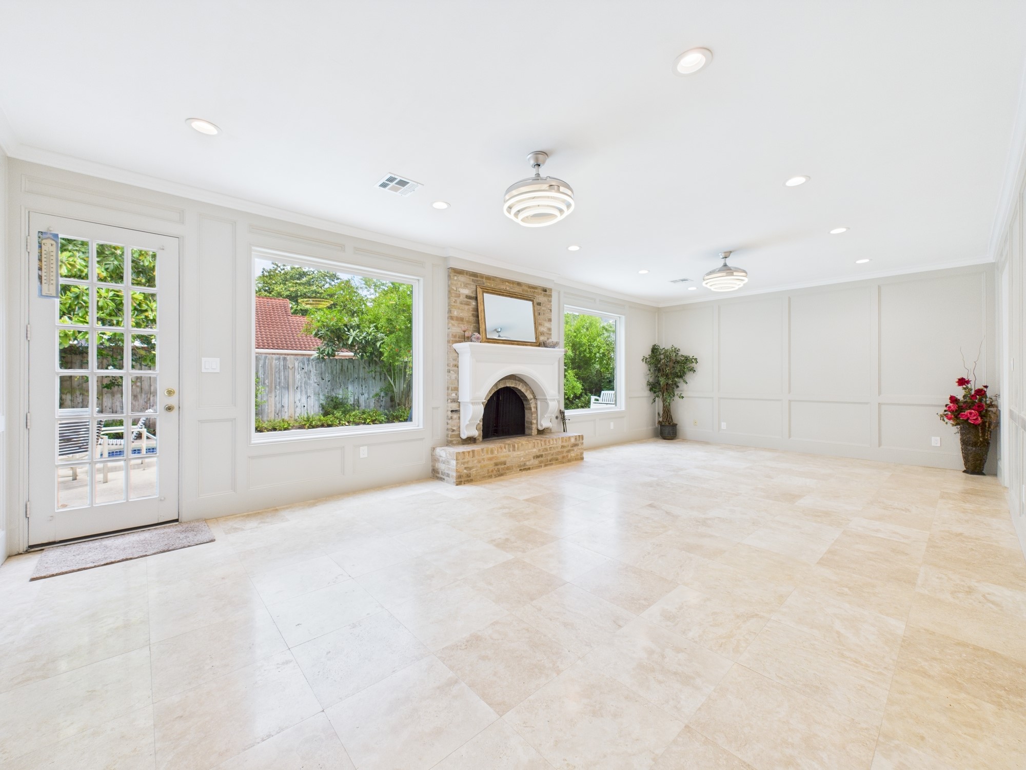 702 Daria Court Houston, TX 77079 - Photo 18 of 44 Two 5x6 Windows Flood the Family Room with Natural Lighting and Pool Views