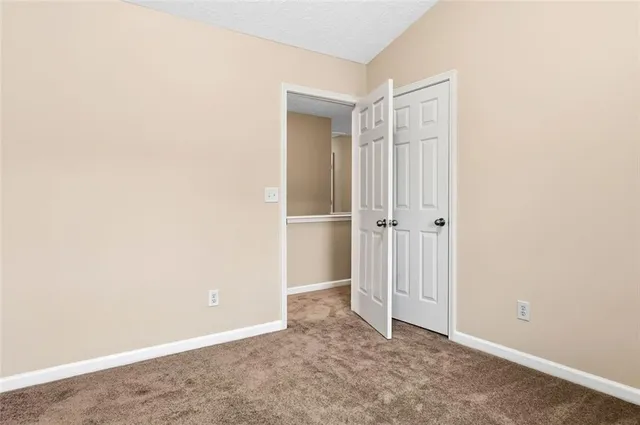 an empty room with closet