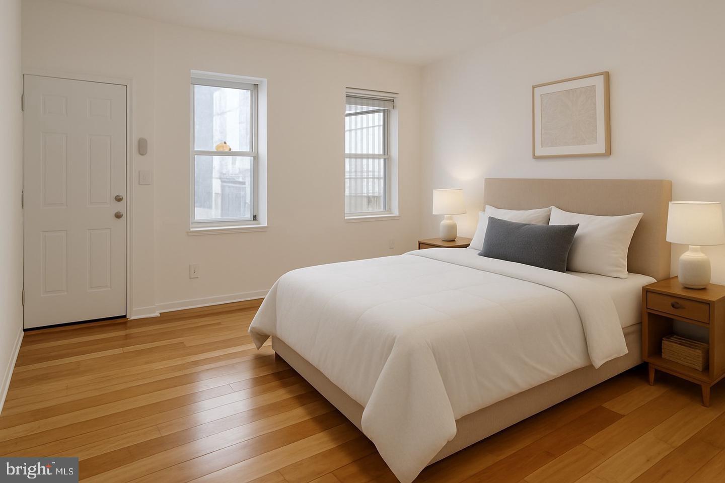 5835 Arch Street Philadelphia, PA 19139 - Photo 11 of 21 a bedroom with a bed and window