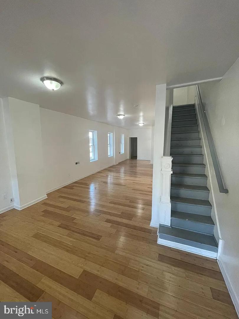 5835 Arch Street Philadelphia, PA 19139 - Photo 15 of 21 a view of an empty room with wooden floor