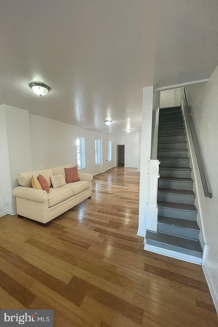 5835 Arch Street Philadelphia, PA 19139 - Photo 16 of 21 a living room with furniture and a wooden floor