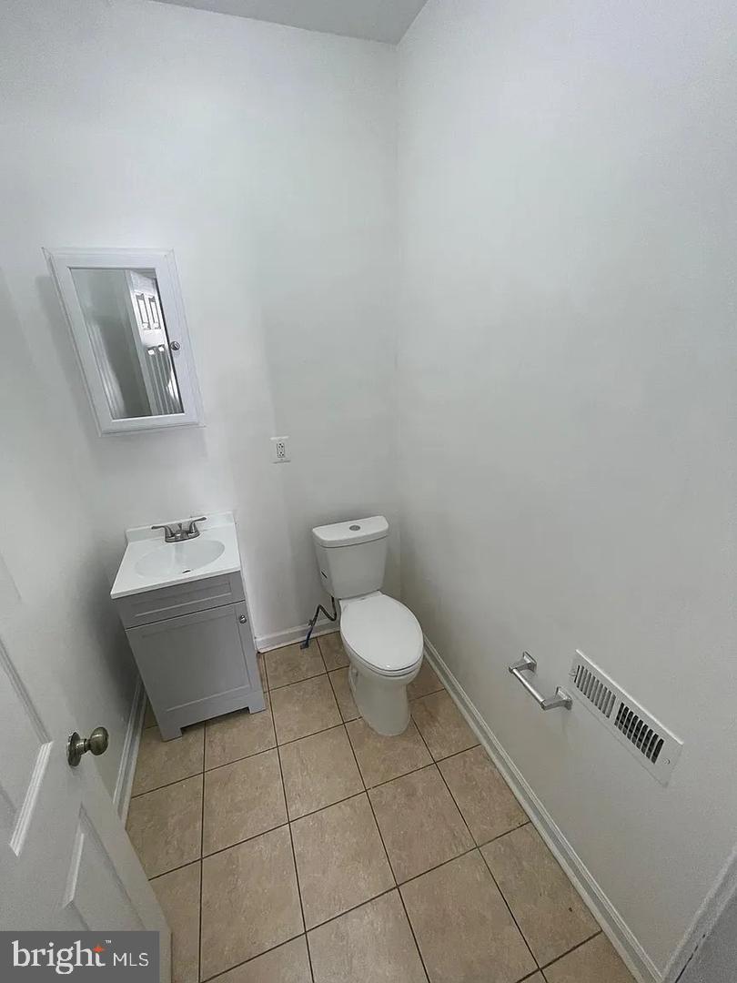 5835 Arch Street Philadelphia, PA 19139 - Photo 17 of 21 a bathroom with a toilet