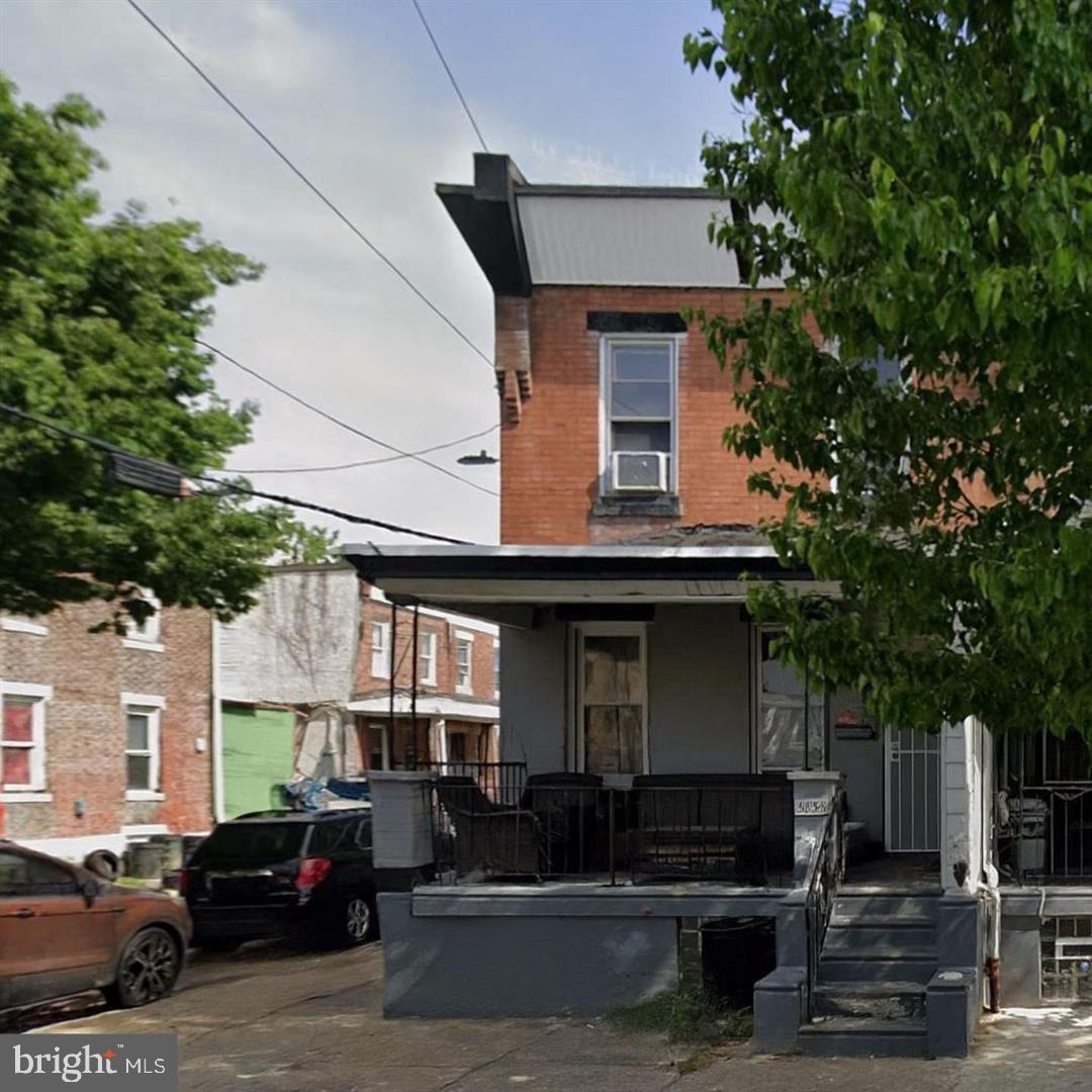 5835 Arch Street Philadelphia, PA 19139 - Photo 21 of 21 a front view of a building with parking space