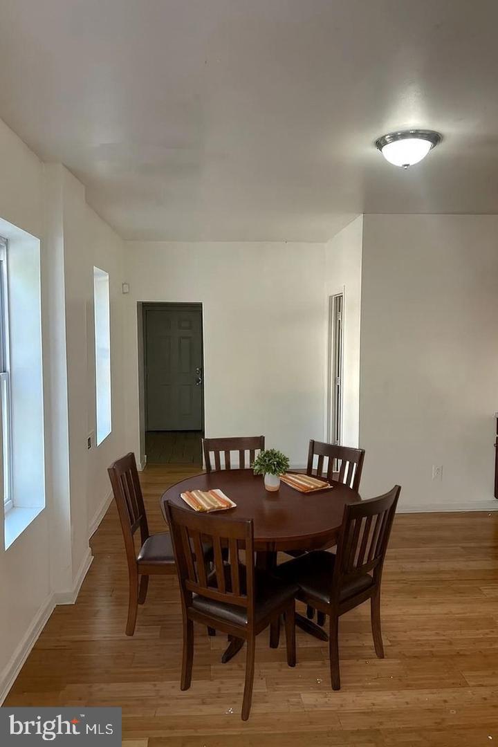 5835 Arch Street Philadelphia, PA 19139 - Photo 3 of 21 a view of a dining room with furniture