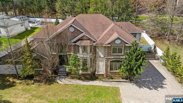 a house with trees in the background