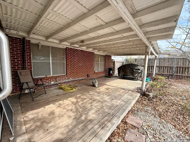 a house with swimming pool in front of it